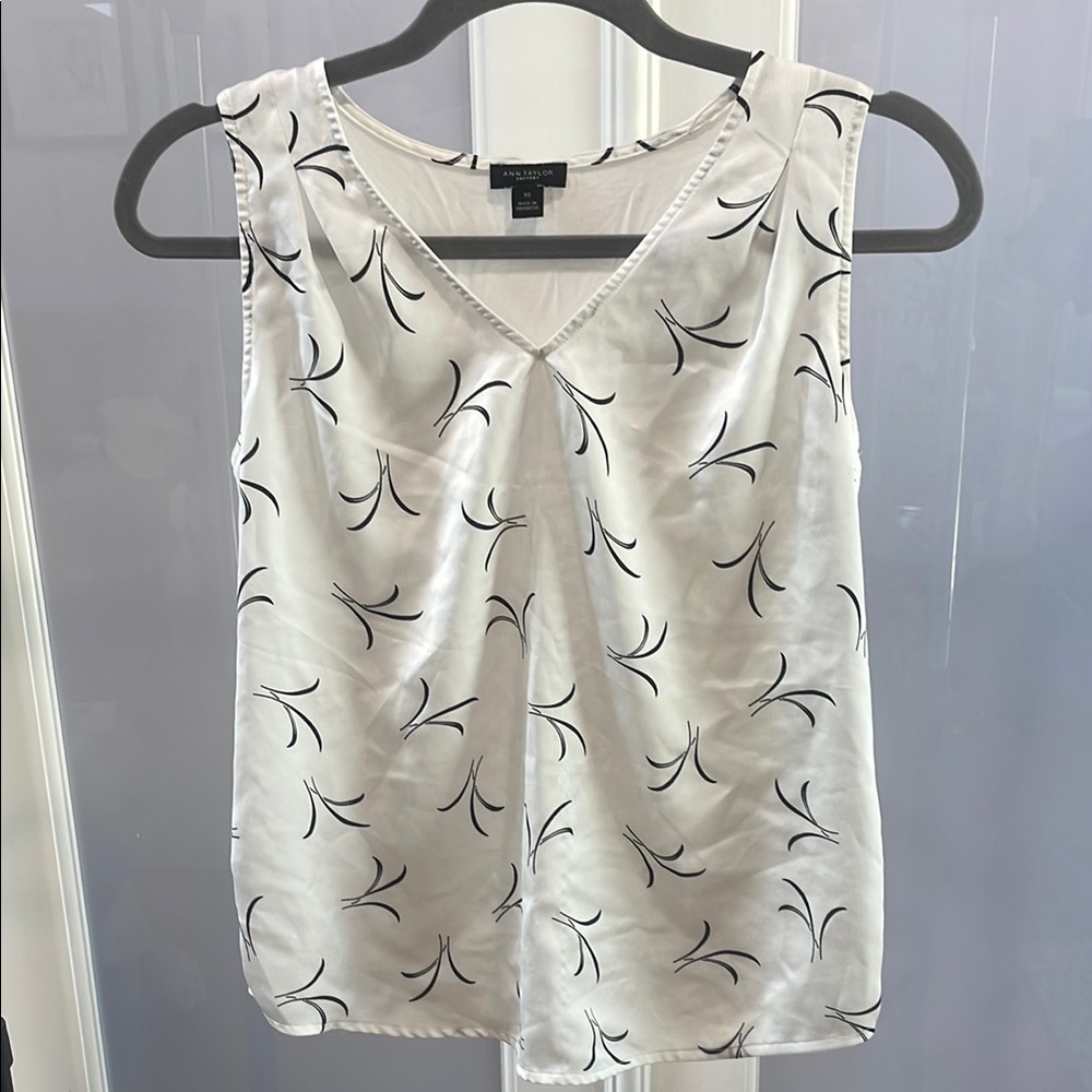 White Sleeveless Top with Black Pattern